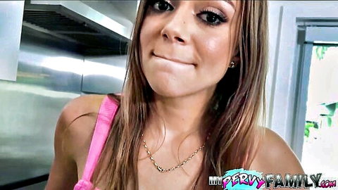 Havana Bleu as curvy Latina stepmom in pink top, smiling seductively