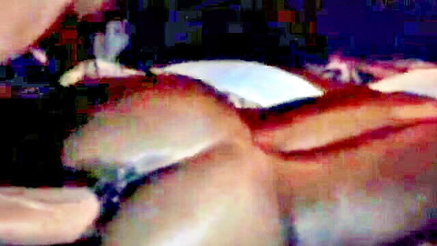 Curvy ebony woman posing from behind with big round ass exposed