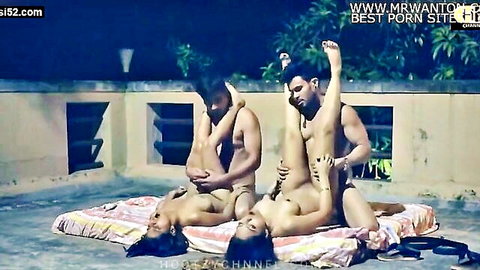 Busty Indian MILFs fucked by three muscular men in outdoor rooftop foursome with legs spread and cocks out