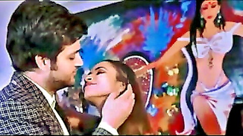 Suited Indian man passionately kisses sexy South Asian babe's lips intensely