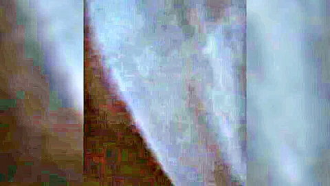 Blurry close-up of mature woman's exposed pussy in taboo mom-son scene