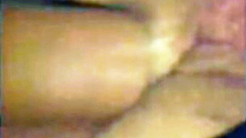 Blurry close-up of yellowish internal fleshy folds and cavity