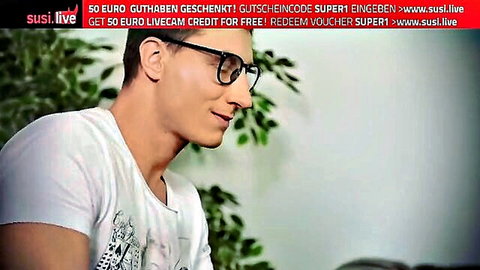 Handsome man with glasses smiling in Susi Live promo, Erica Fontes cutie next door series