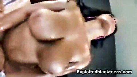 Black teen with massive tits exposed lying back mouth open for POV blowjob