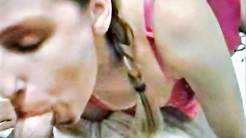 Heather Harmon blonde in pink lingerie giving blowjob close-up
