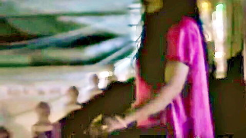Desi Indian Bhabhi in pink dress leaning over balcony, anal tease part 1
