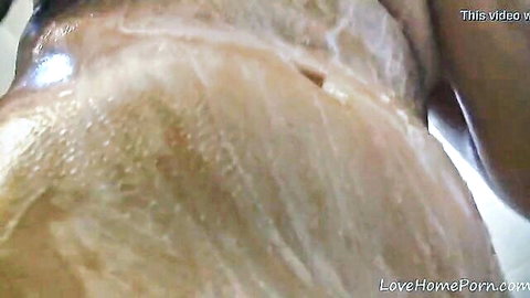 Stunning amateur beauty with perfect curves showers sensually