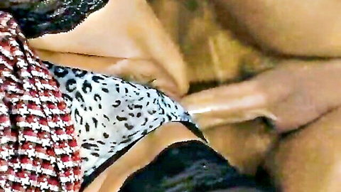 Linda Lan in leopard lingerie, hand fingering her pussy up close
