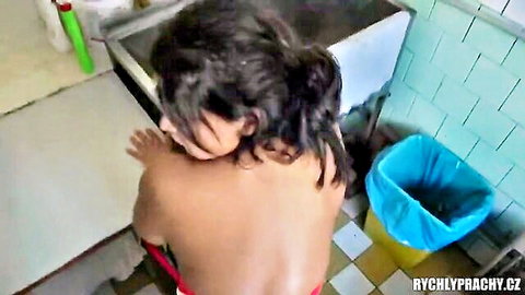 Nude chef with giant natural tits bending over sink in kitchen