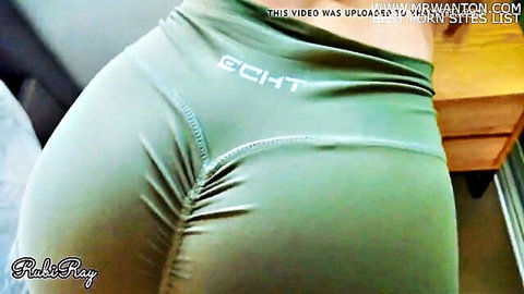 Curvy woman in tight yoga pants showing off her big ass after workout