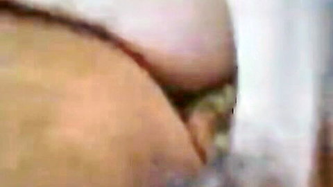 Close-up of mature Russian woman's big ass and exposed pussy with cum