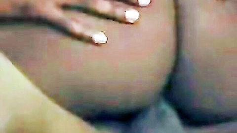 Close-up of big round black ass bent over in onion booty pose