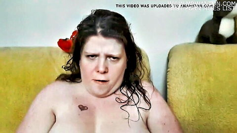 Curvy brunette BBW with big tits sitting topless, squirting solo tease