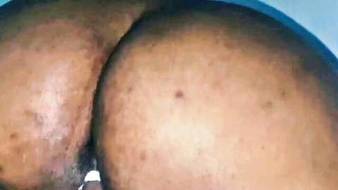Ebony woman's huge black ass cheeks spread wide showing tight pussy and asshole closeup