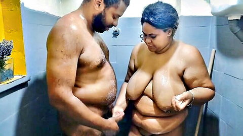 Curvy dark-skinned stepmom with huge tits groped by stepson in shower bath
