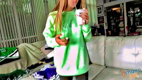 Cute blonde Clara Trinity in green sweatshirt holding drink, cheer tease