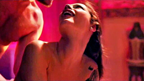 Nikita Bellucci topless laughing as Ian Scott kisses her neck passionately