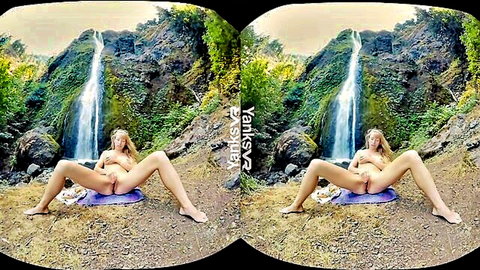 Verronica masturbates with vibrator outdoors by waterfall in VR