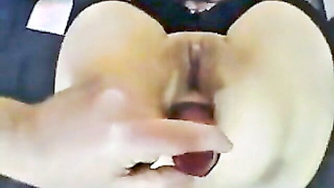 Close-up of big pale ass with anal fingering penetration