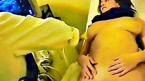 Busty MILF topless during intimate breast exam by doctor