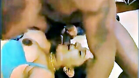 Mature British Indian woman giving oral to muscular ebony man