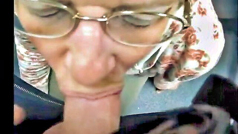 Mature granny with glasses swallows cum in close-up oral scene