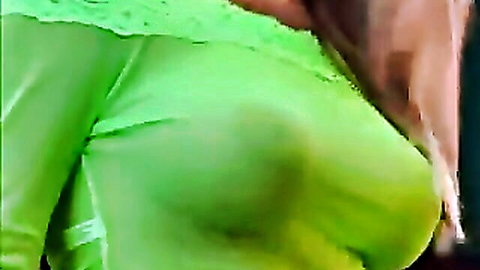 Alison teasing in sheer green top revealing her big breasts