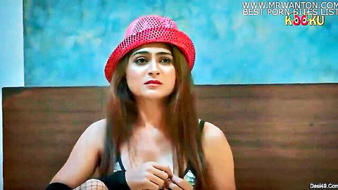 Indian wife in red hat showing cleavage in black top and fishnets