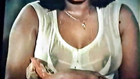 Busty South Asian babe in wet see-through tank top exposing hard nipples