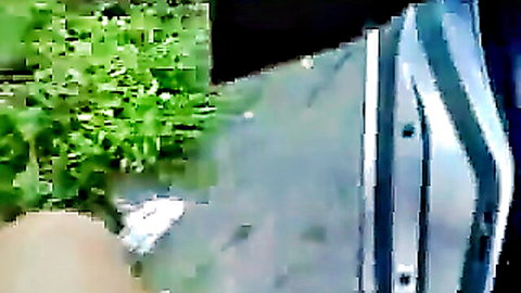Exhibitionist woman flashing outdoors in neighborhood near car