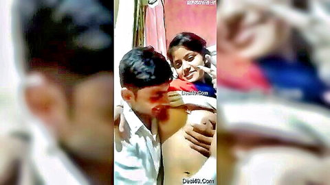Desi couple in intimate back hug exposing woman's midriff