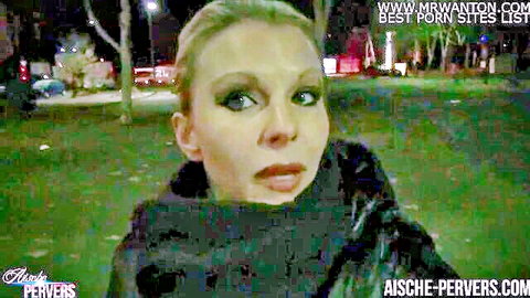 Aische Pervers seductive outdoor pose in Berlin night, blonde model in fur coat