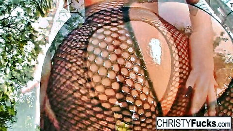 Christy Mack teases with big ass in wet fishnet stockings
