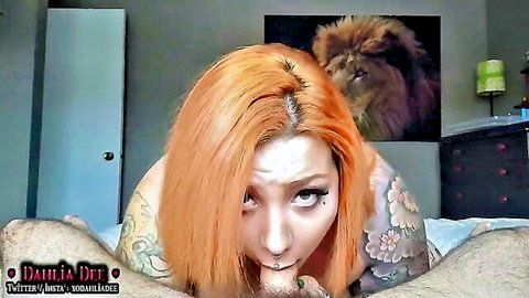 Dahlia Dee ginger with tattoos gives blowjob and rimjob POV