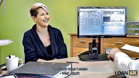 Smiling blonde office babe in cardigan flirts with coworker at desk before fucking