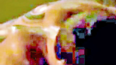 Close-up of blonde woman with wide-open mouth in intense oral pleasure