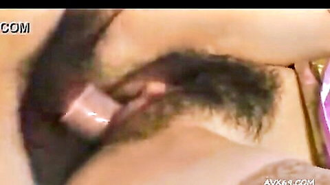 Close-up of sexy Japanese mommy with hairy pussy penetrated