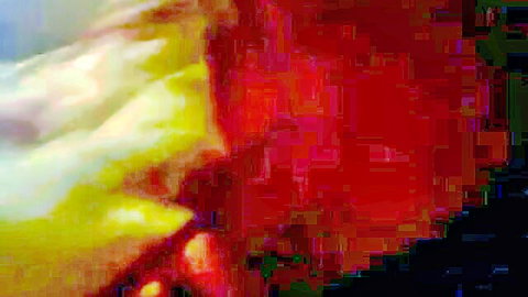 Blurry close-up of red-haired woman in steamy adult scene