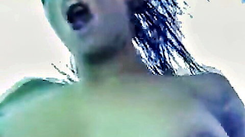 Candy Samira topless in solarium, blue hair, open mouth ecstasy