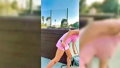 Curvy young babe bending over in tight pink shorts showing big ass on tennis court