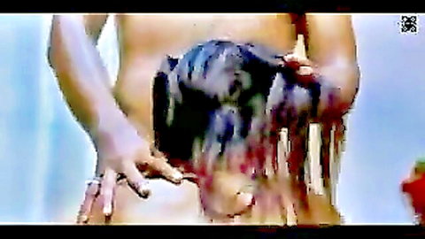 Desi couple in wet intimate scene, man pulling woman's long hair from behind