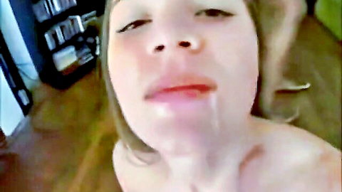 Vintage close-up of woman drooling with open mouth, topless and messy