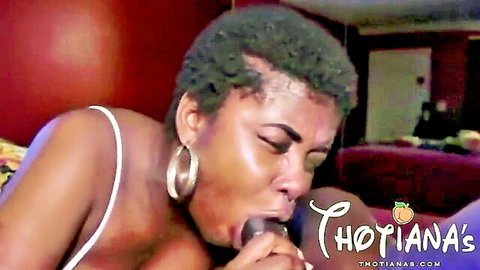 Ebony woman with hoop earrings deepthroats thick black cock in amateur blowjob