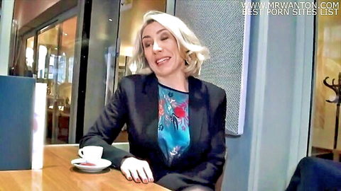 Blonde French teacher Julie in blazer and blouse at cafe