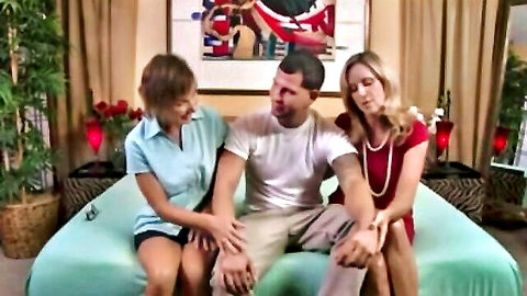 Jodi West and Lillian Tesh with man in intimate clothed threesome setup