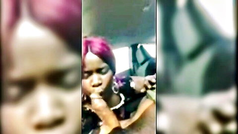 Black woman with purple hair giving messy blowjob in car