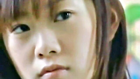 Close-up of young Japanese woman with innocent expression, JAV step-father fantasy thumbnail