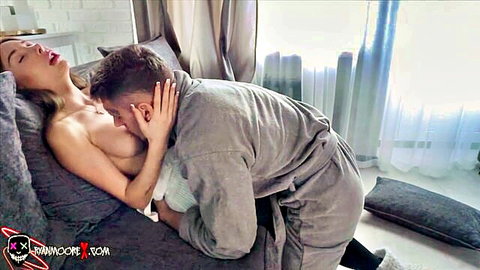 Blonde babe's medium tits exposed as muscular man in robe passionately kisses her neck on bed