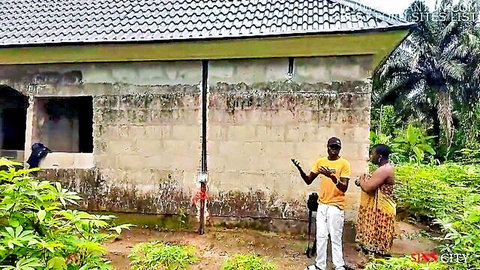 Ebony woman in dress seduces electrician outdoors in tropical yard
