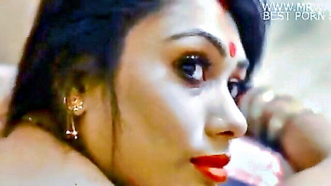 Seductive Indian bhabhi Nancy in traditional attire, close-up profile view